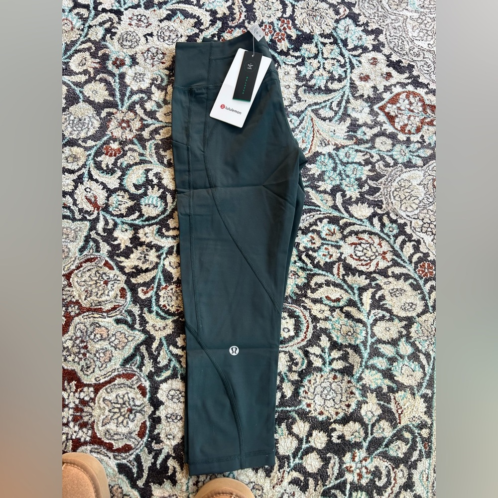 Time to sweat crop leggings in dark olive